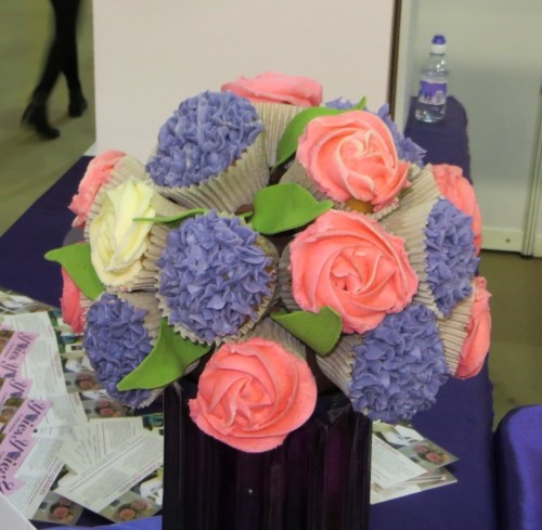 A floral bouquet made out of cupcakes by Yvies Cupcakes