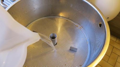 In spite of dire warnings about stuck sparges, this one went well.  You just gently pour the hot water onto the top plate above the grain.