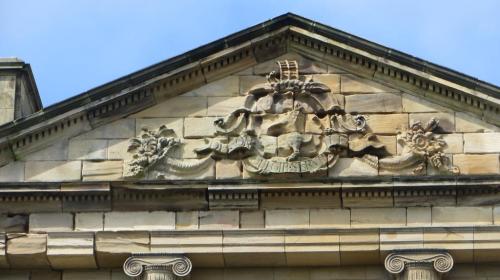 The coat of arms of the Grey family, showing the scaling ladder at the top which is their famous mark